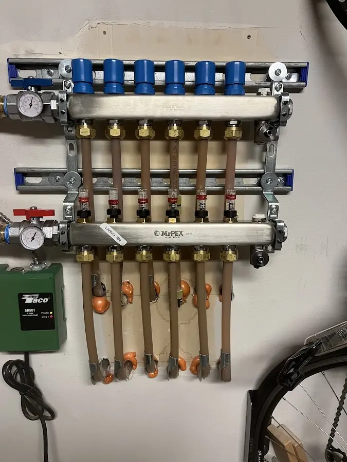 Plumber performing Gas Line Installation at a residential property in Jemison